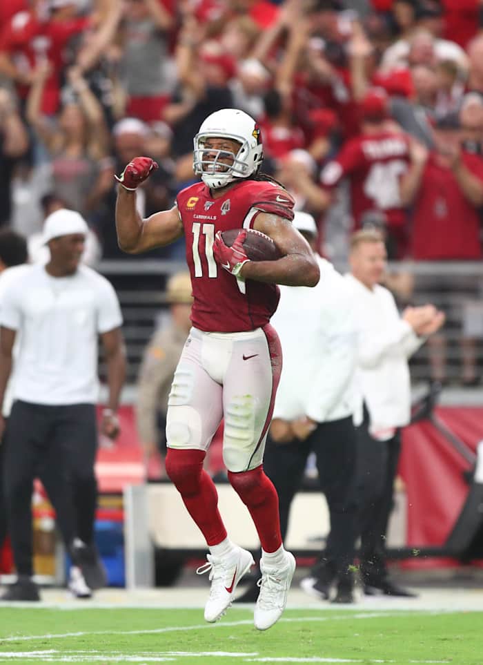Wide receiver Larry Fitzgerald celebrates after making a catch in the fourth quarter during a 2019 game against the Lions.